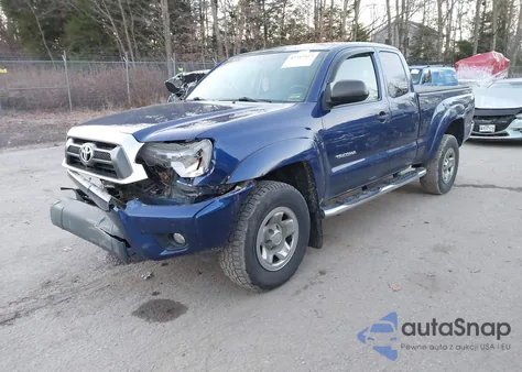2015 Toyota Tacoma Base V6 z USA, uszkodzony, nr VIN 5TFUU4EN5FX115971